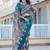 teal cotton blend saree with floral print