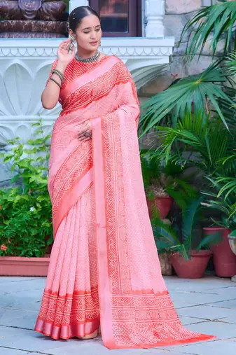coral pink cotton blend saree with floral border print