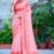 coral pink cotton blend saree with floral border print