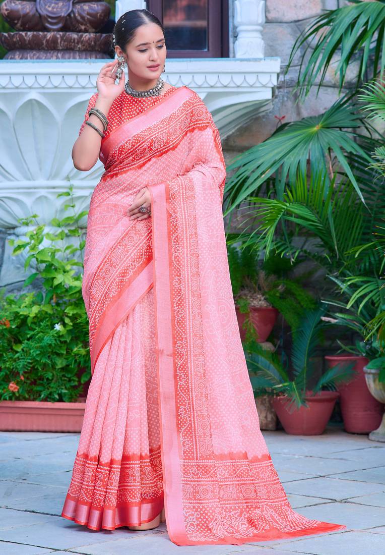 coral pink cotton blend saree with floral border print