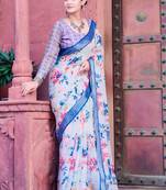 white blue cotton blend saree with floral border print
