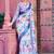 white blue cotton blend saree with floral border print