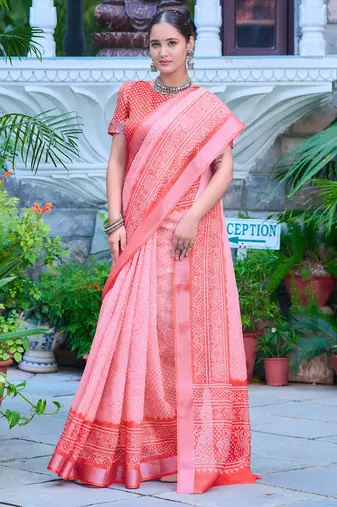 coral pink cotton blend saree with floral border print