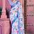 white blue cotton blend saree with floral border print