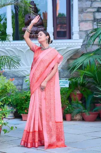 coral pink cotton blend saree with floral border print