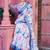 white blue cotton blend saree with floral border print