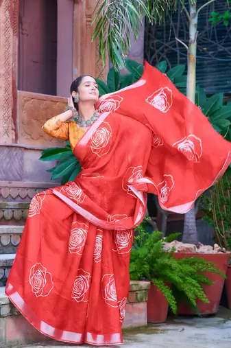 red white cotton blend saree with floral print