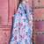 white blue cotton blend saree with floral border print