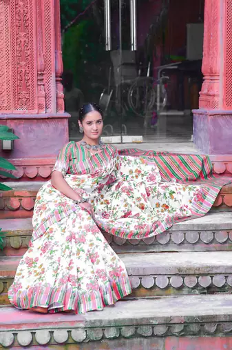 white green cotton blend saree with floral border print