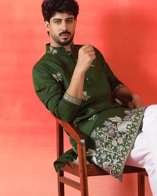 Cotton silk ethnic motifs embroidered green kurta 1