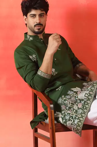 Cotton silk ethnic motifs embroidered green kurta