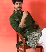 Cotton silk ethnic motifs embroidered green kurta