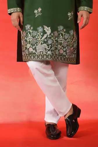 Cotton silk ethnic motifs embroidered green kurta