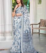 white blue cotton blend saree with floral print