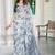 white blue cotton blend saree with floral print