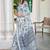 white blue cotton blend saree with floral print