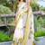 white yellow cotton blend saree with floral border print