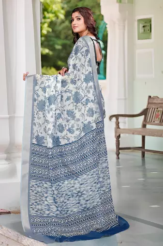 white blue cotton blend saree with floral print