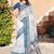 white blue cotton blend saree with floral border print