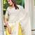 yellow white cotton blend saree with floral print