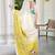 yellow white cotton blend saree with floral print