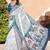 white blue cotton blend saree with floral border print