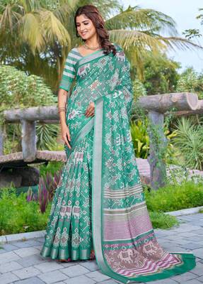 sea green cotton blend saree with floral border print 1