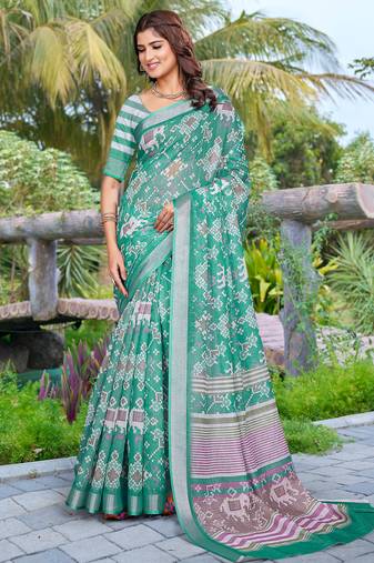 sea green cotton blend saree with floral border print