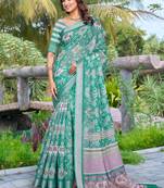 sea green cotton blend saree with floral border print