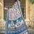 white blue cotton blend saree floral border print