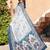 white blue cotton blend saree with floral border print