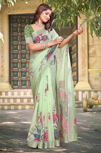 green cotton blend saree with floral print