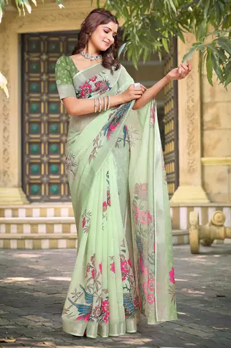 green cotton blend saree with floral print