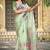 green cotton blend saree with floral print