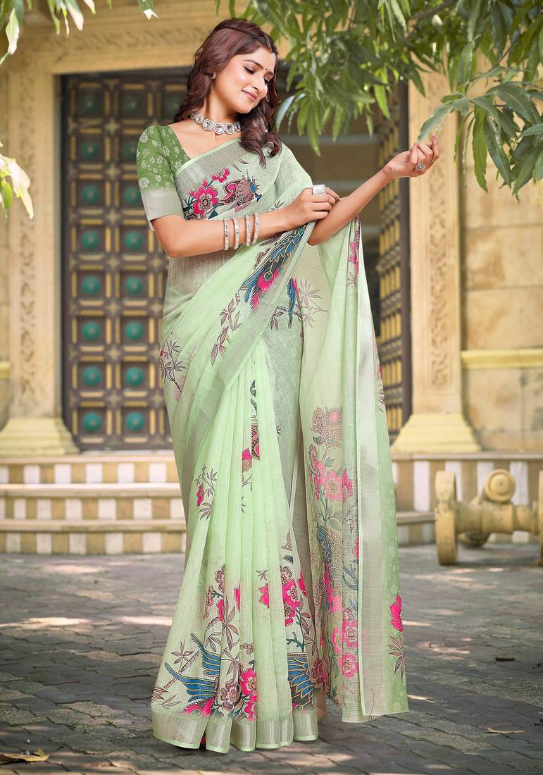 green cotton blend saree with floral print