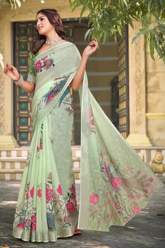 green cotton blend saree with floral print