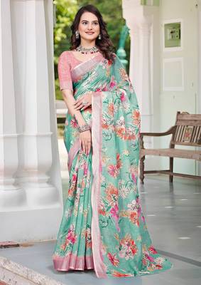 sea green cotton blend saree with floral print 1