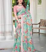 sea green cotton blend saree with floral print