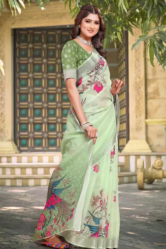 green cotton blend saree with floral print