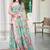 sea green cotton blend saree with floral print