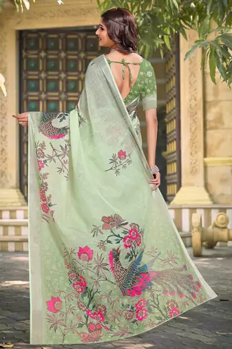 green cotton blend saree with floral print