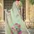 green cotton blend saree with floral print
