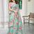 sea green cotton blend saree with floral print
