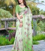 green cotton blend saree with floral print