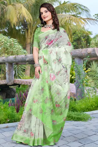green cotton blend saree with floral print