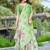 green cotton blend saree with floral print