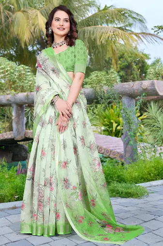 green cotton blend saree with floral print