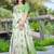 green cotton blend saree with floral print