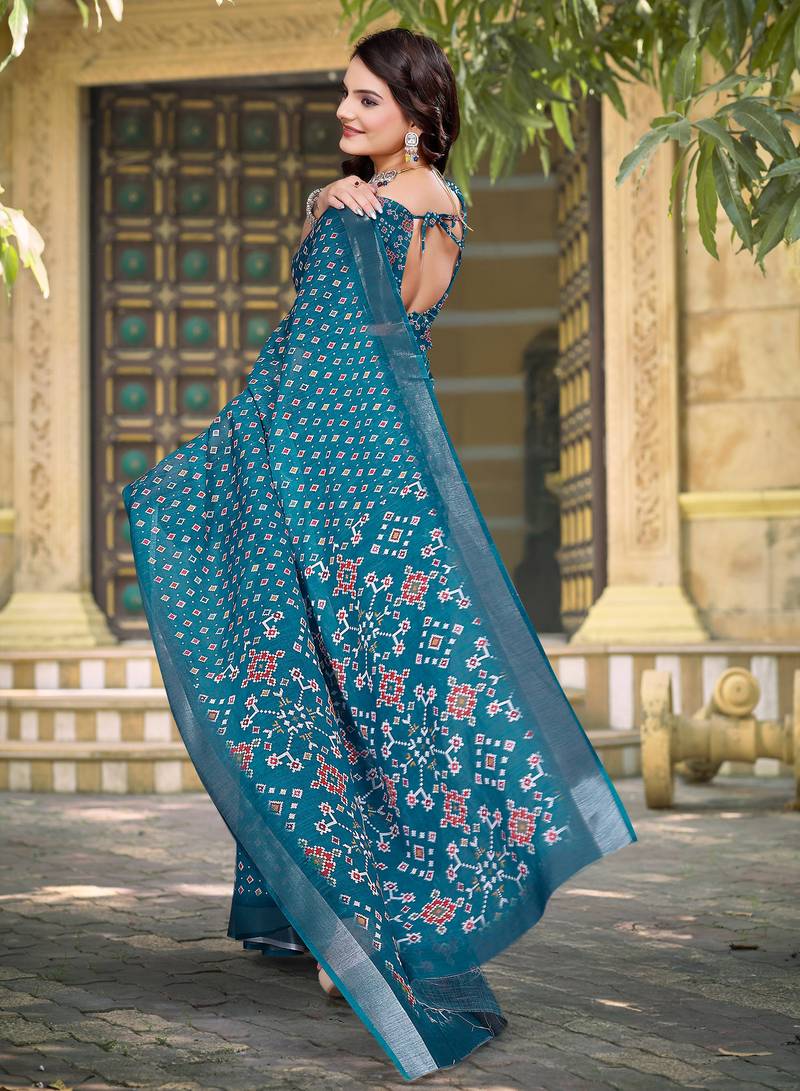 teal blue cotton blend saree with polka floral print