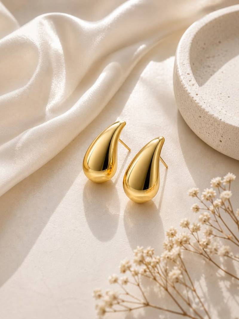 Teardrop anti tarnish gold tone stud earrings